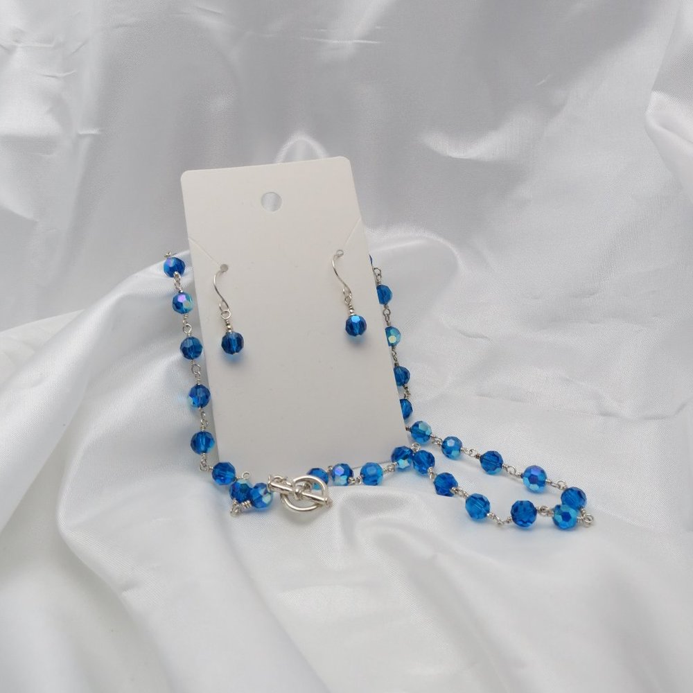 Handmade Capri Blue sterling silver crystal necklace with matching earrings